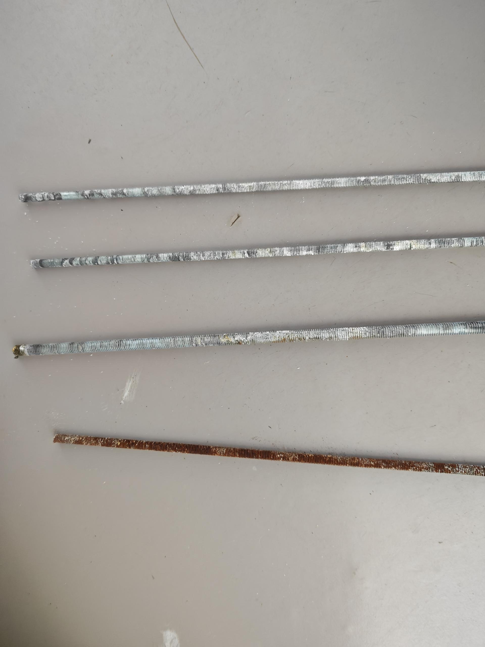 White rust versus red rust comparison on plated sleeve anchor fasteners after salt spray exposure