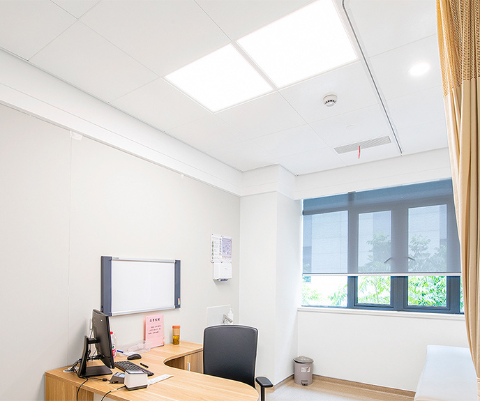 Composite panel installed in a hospital corridor, glass-fiber reinforced composite surface