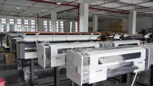 Finished Xinflying DTF printers wrapped in protective film await final preparation, storage, or shipment.