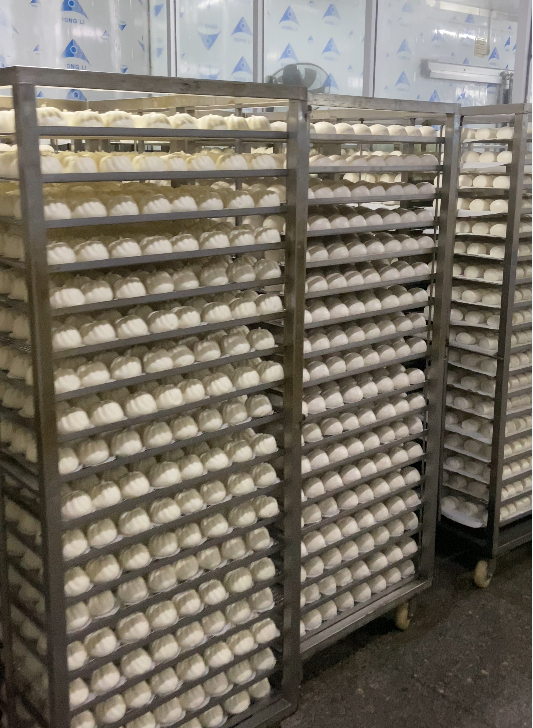 Standardised production line for steamed Cantonese dim sum buns