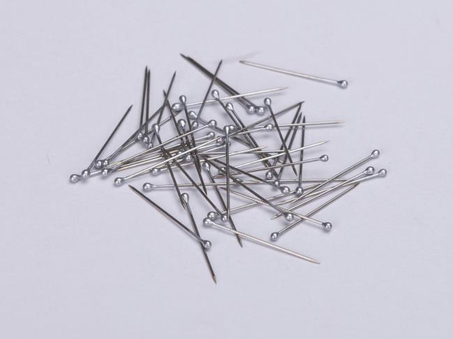 Metal pin for shirt packaging with a 10,000-piece published MOQ
