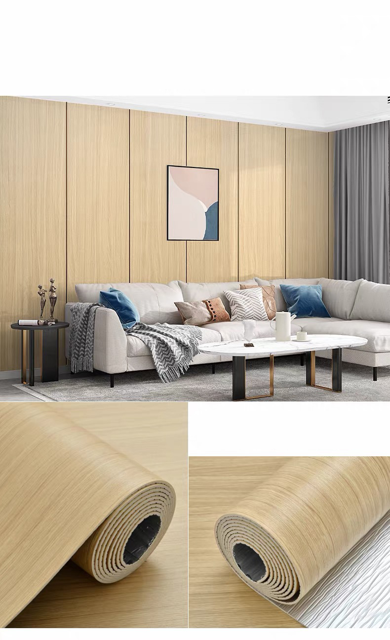 Installing a PVC self-adhesive wall sticker by smoothing the film onto a prepared wall
