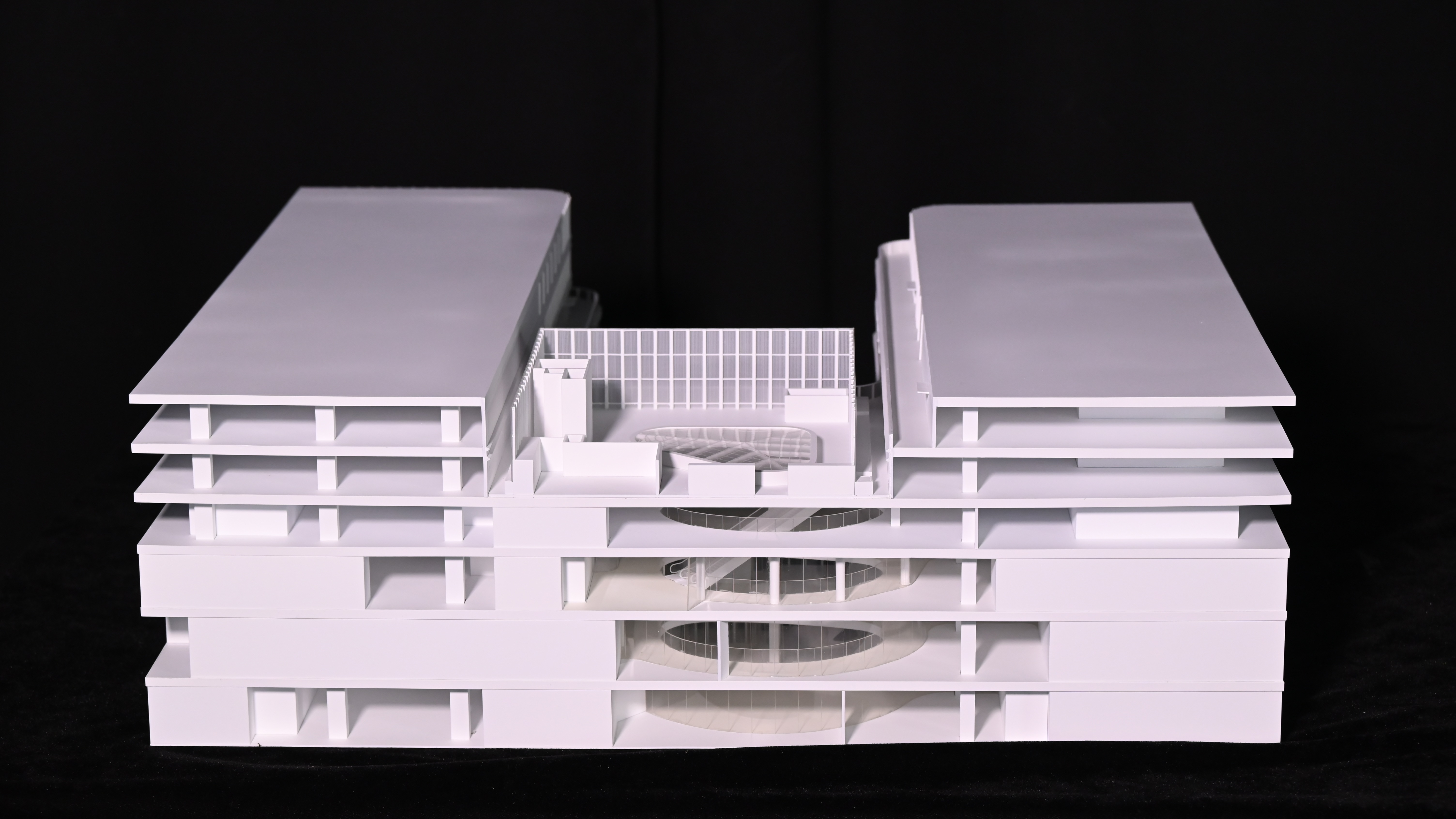 Transit-oriented master plan window display scale model with surrounding urban context