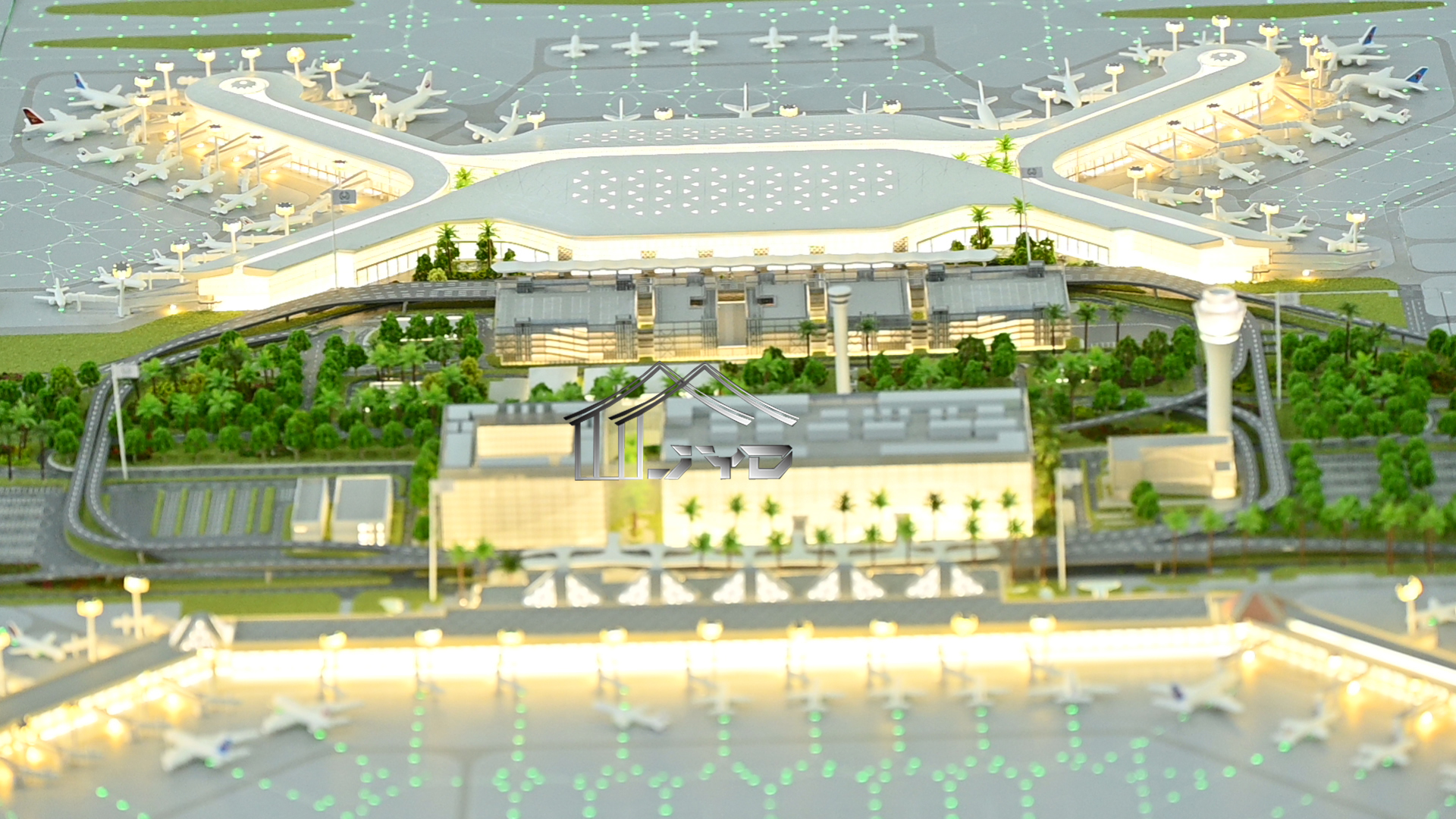 Tourism architectural model of Hainan Meilan International Airport terminal shown in an indoor display setting