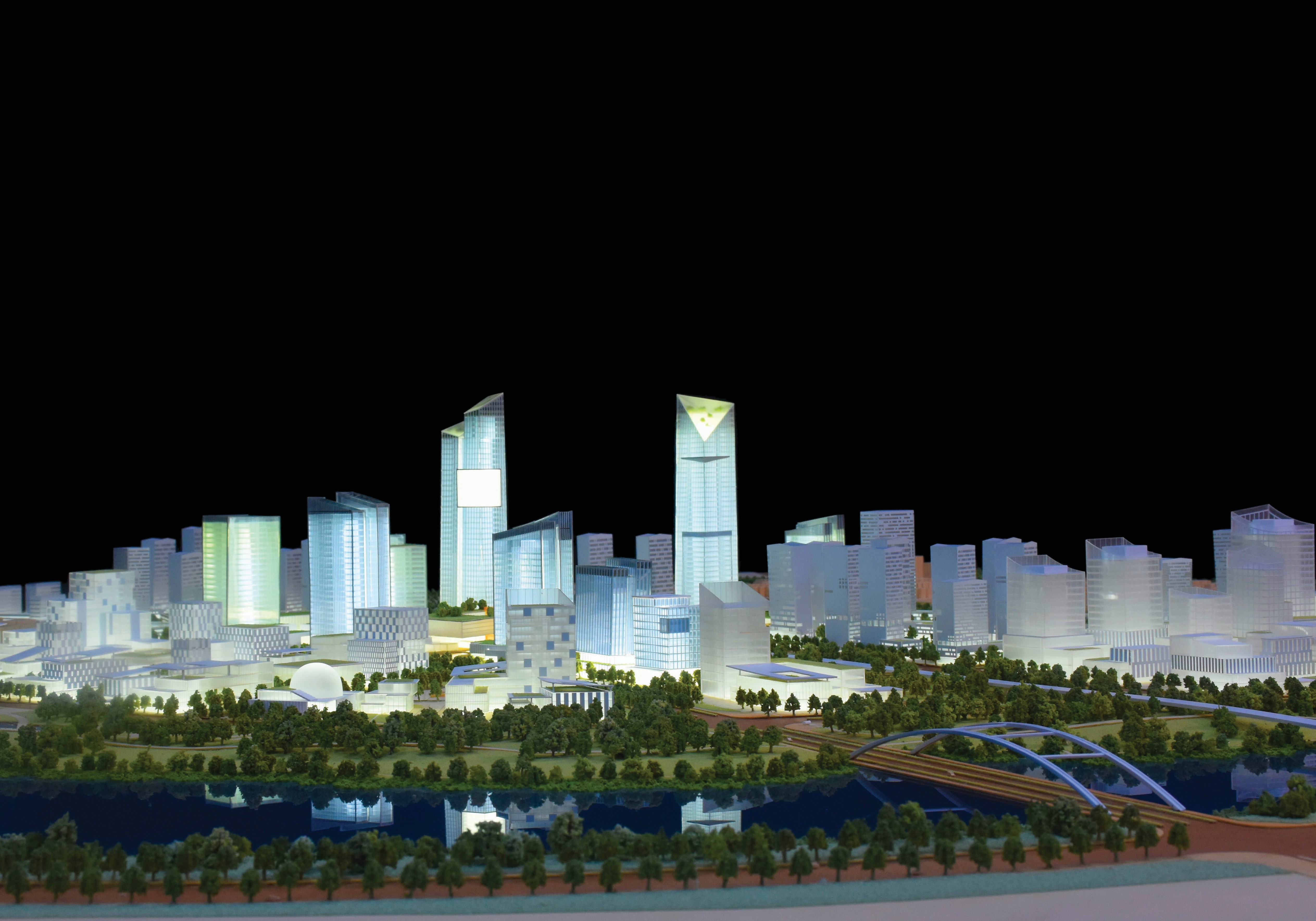 Transport hub architectural model showing rail and road interfaces
