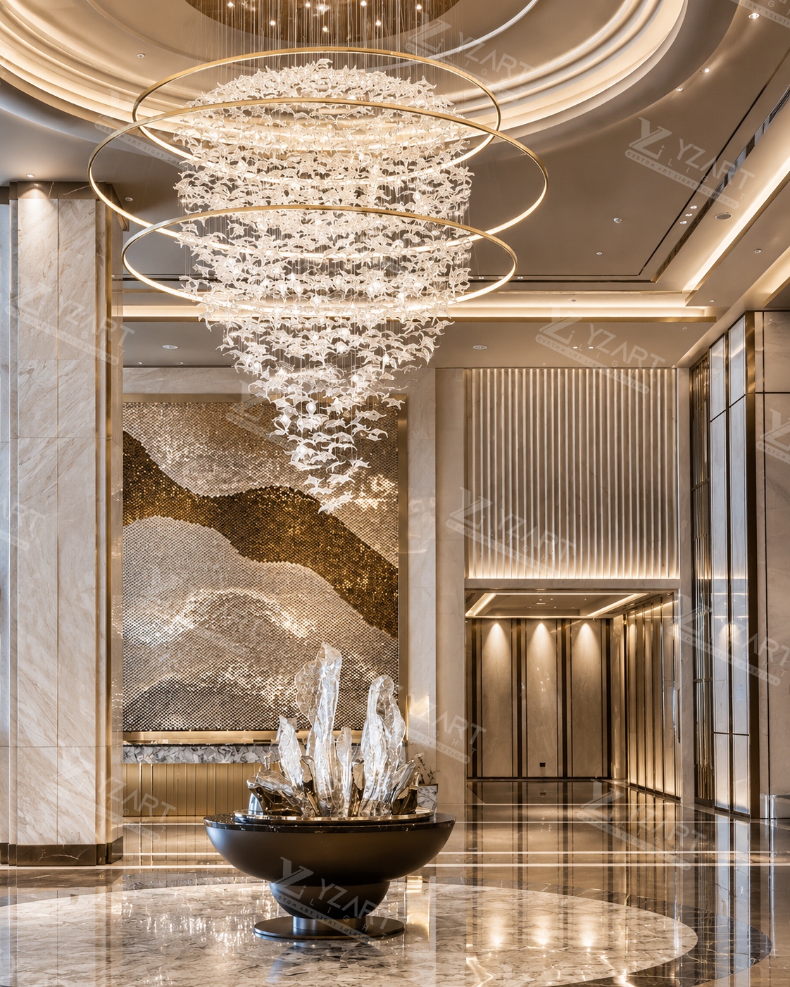 Custom cascading glass leaf chandelier with large gold rings specified for a luxury hotel lobby