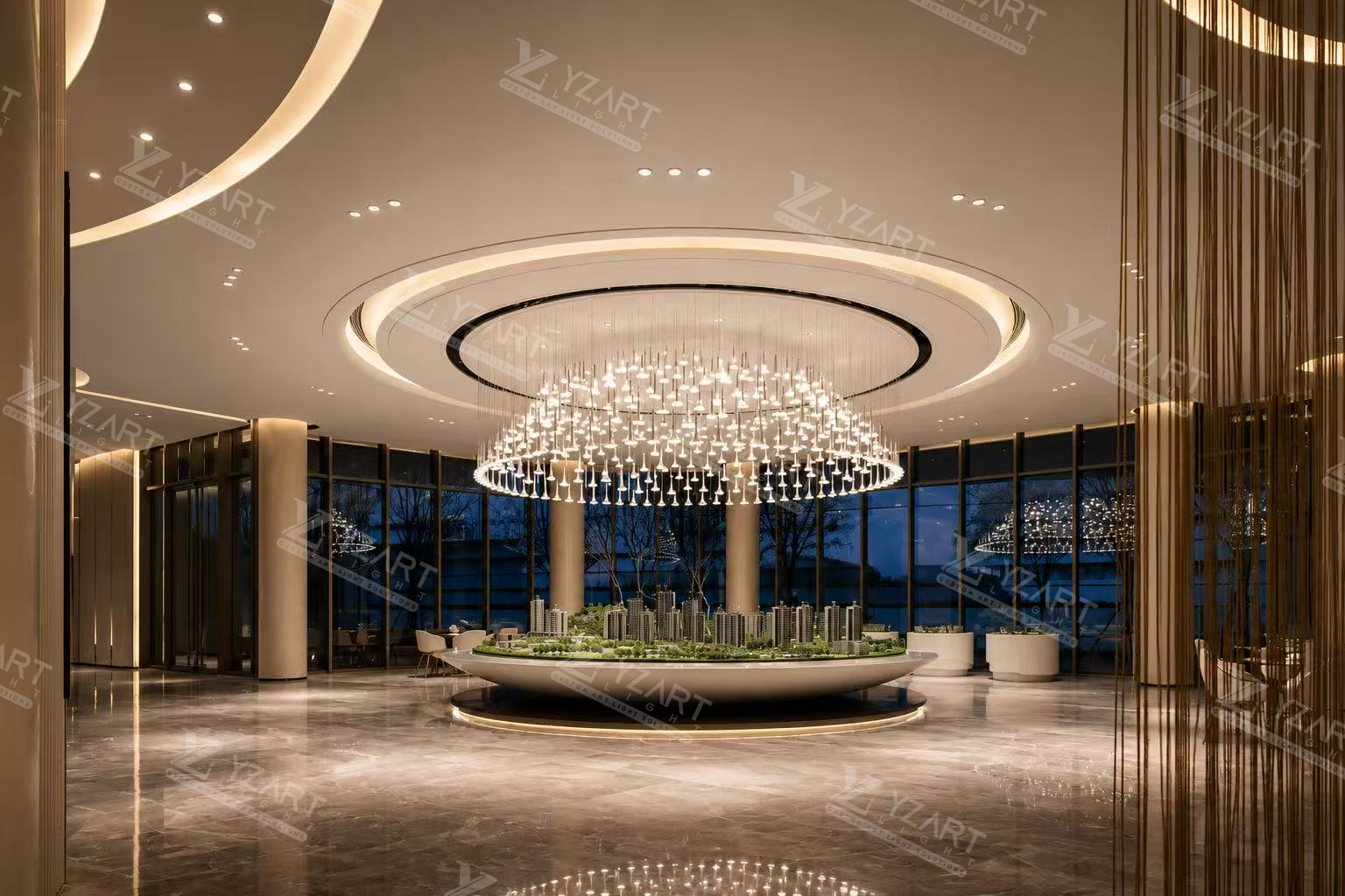 Large circular glass drop decorative pendant specified for a luxury hotel lobby