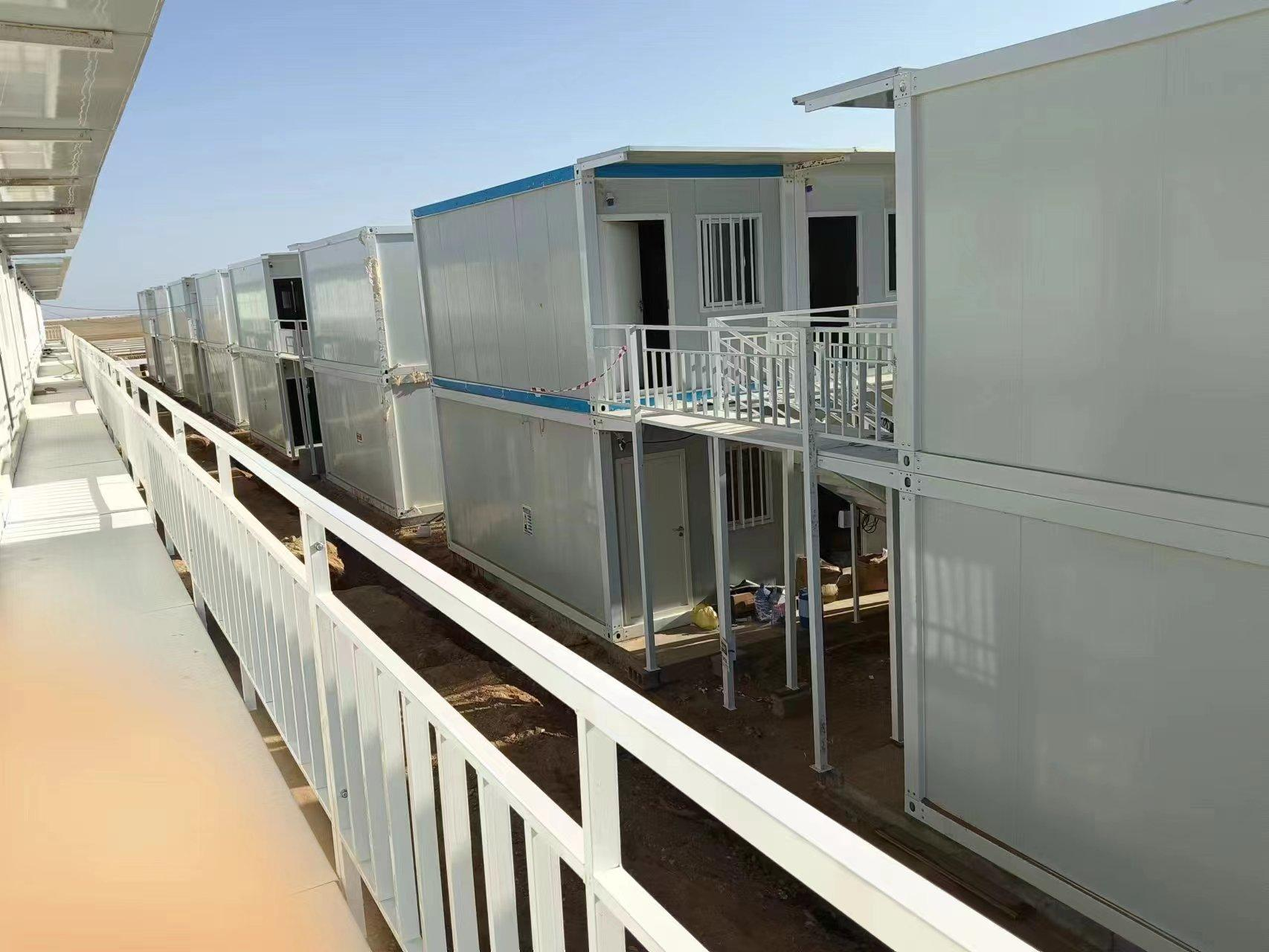 Container house units installed for a work camp at a large overseas project site