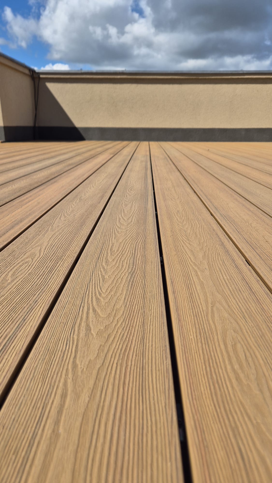Terratsa co-extruded WPC decking installed on an outdoor terrace