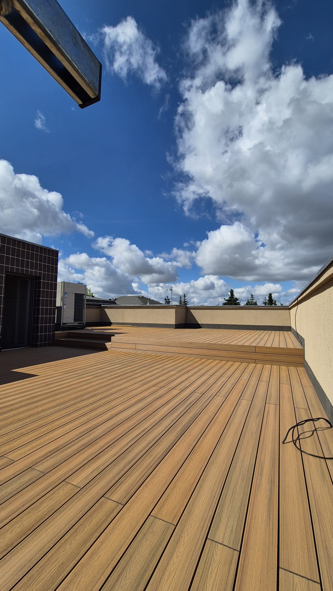 Outdoor WPC decking installed in a terrace project