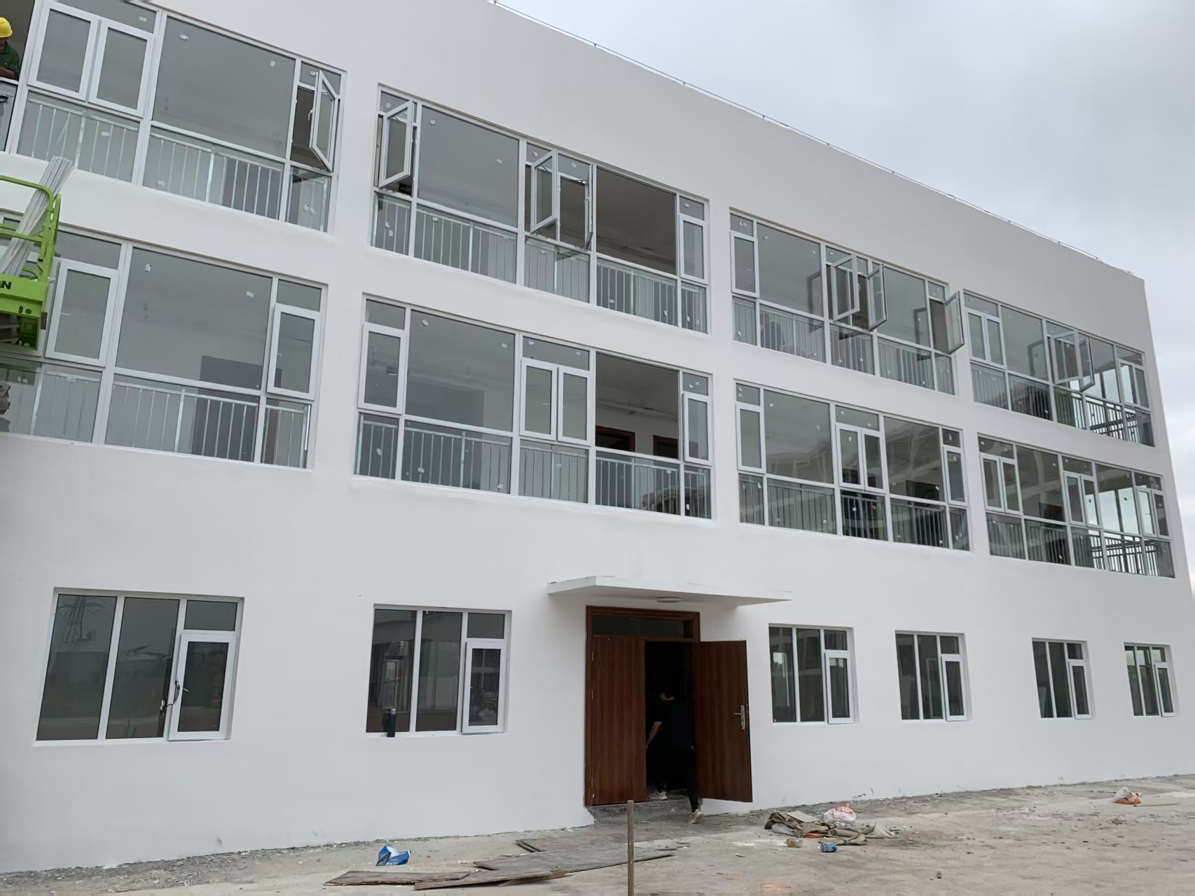 Installed UPVC window units across a full residential floor elevation