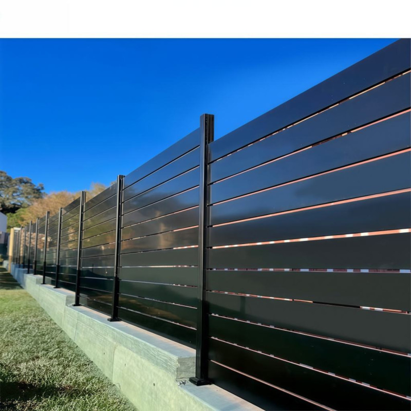 Aluminum security horizontal slat fence used as a site perimeter safety barrier