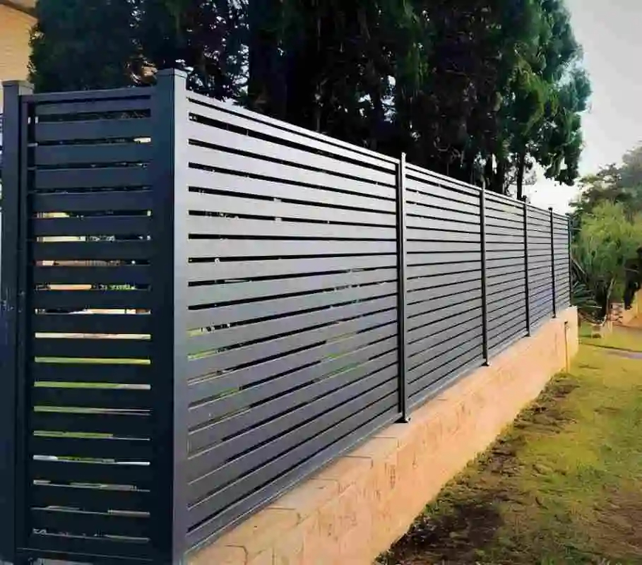 Protective aluminum alloy fence panels forming a continuous perimeter line at a site in the USA