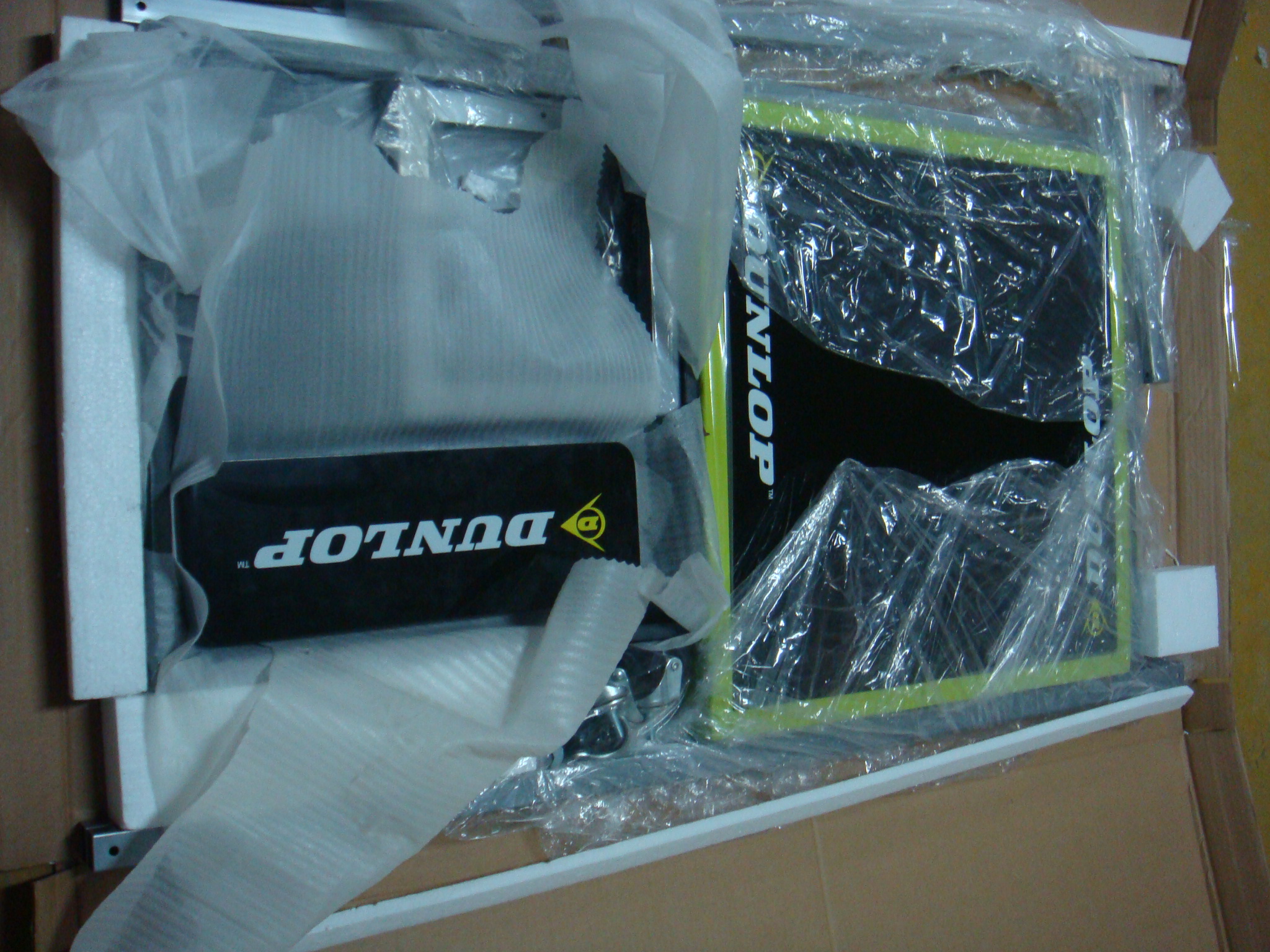 Custom retail display fixture installed in a DUNLOP sports brand store
