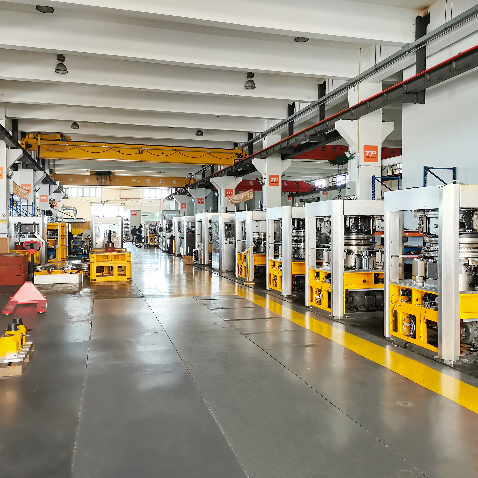 Assemble line for tablet press machines