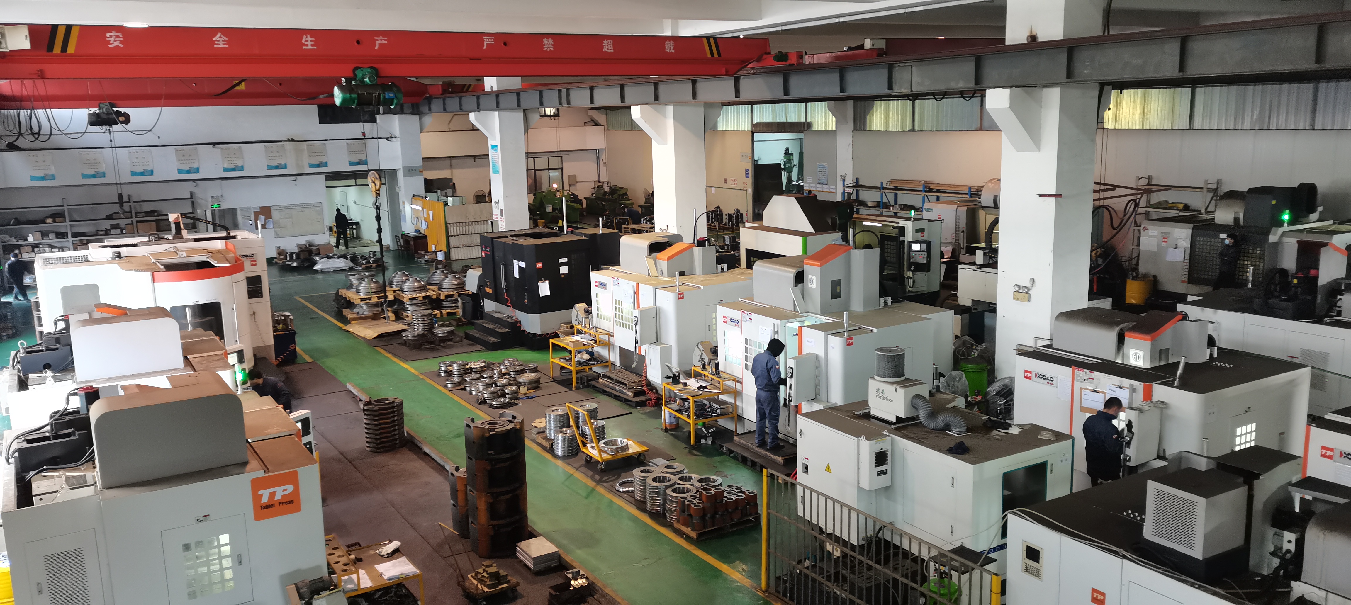 CNC machining workshop producing tablet press and capsule filling machine components