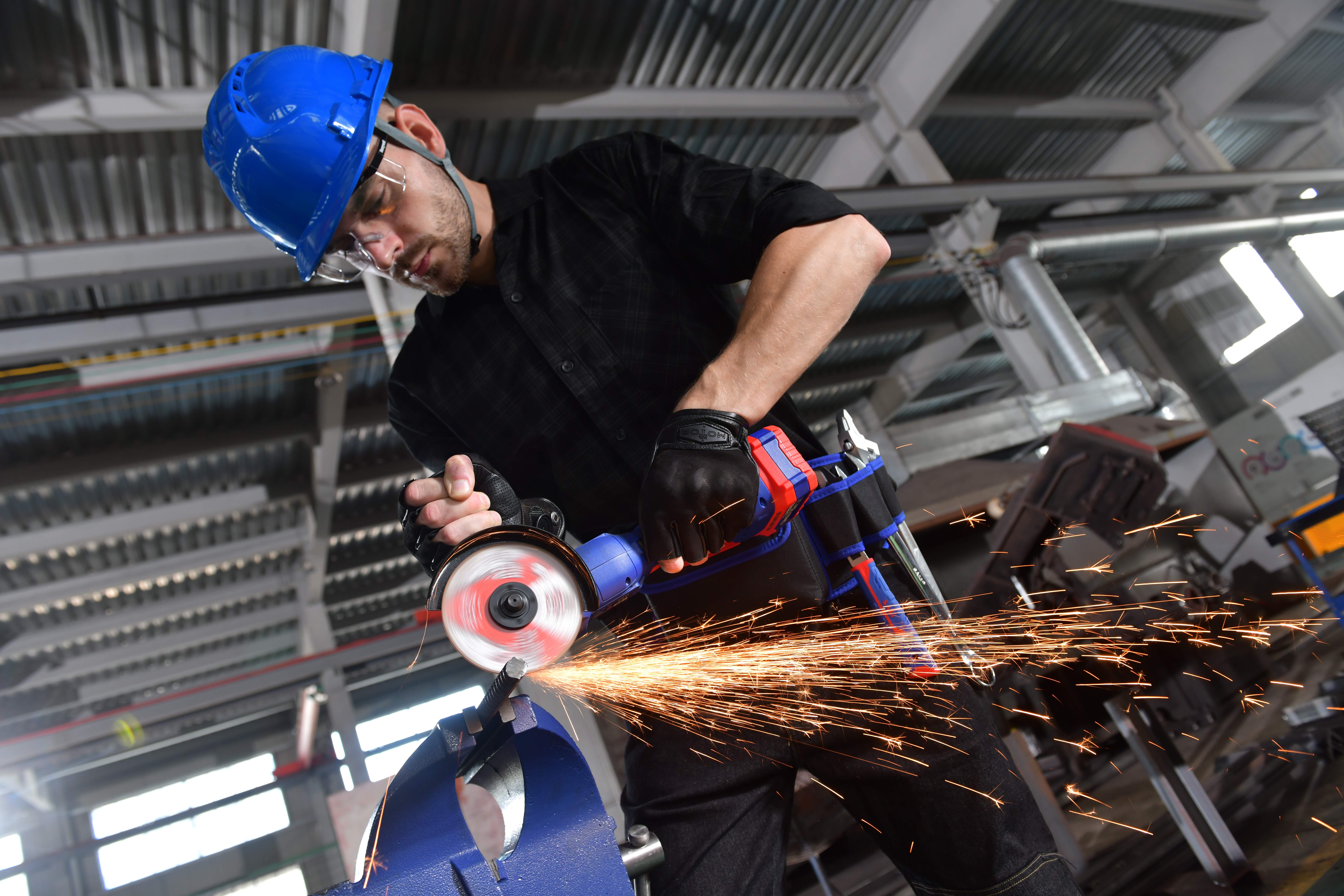 Metal cutting disc in use on a steel fabrication site