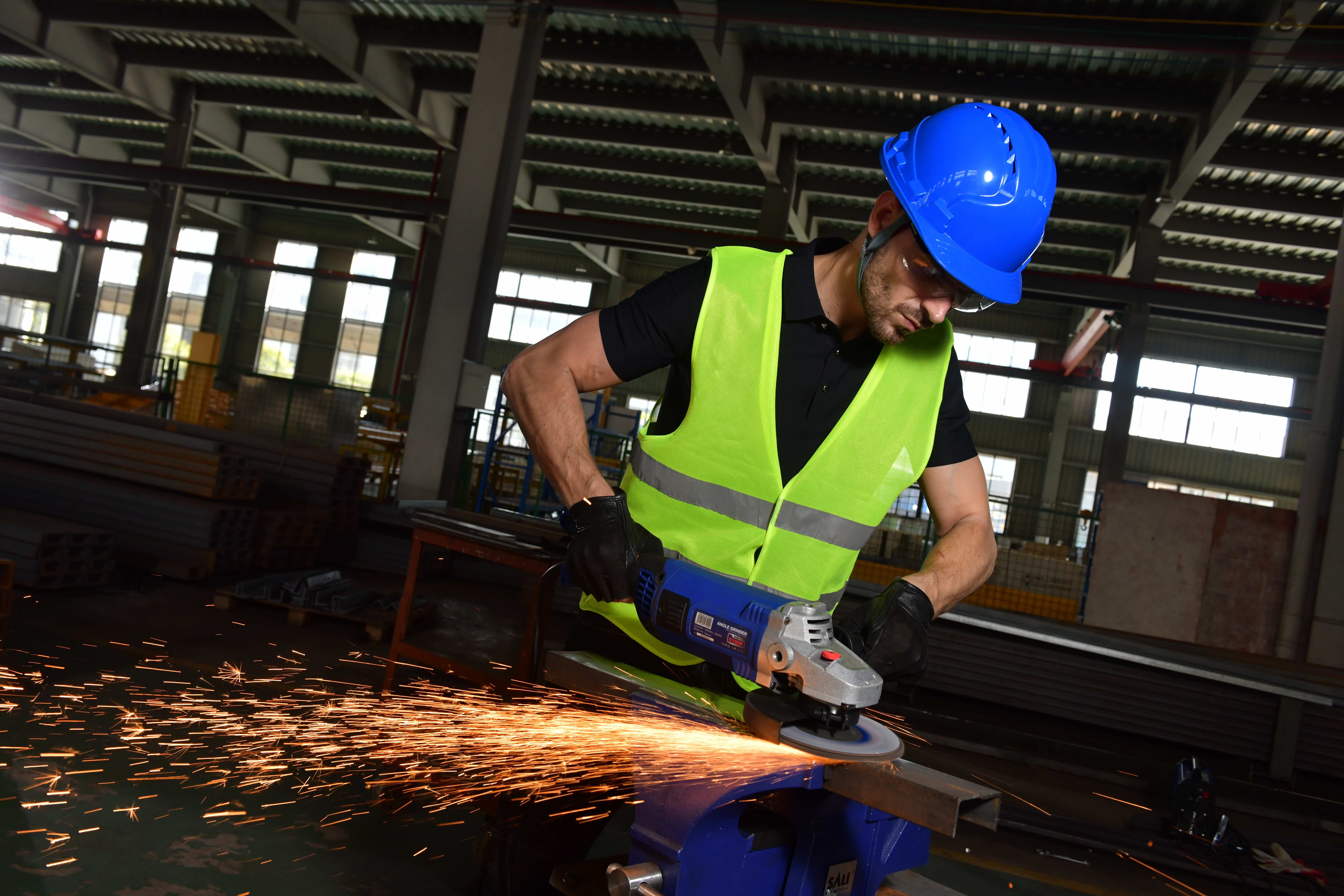 Metal grinding disc working scene Metal grinding disc working on an angle grinder in a metalworking scene