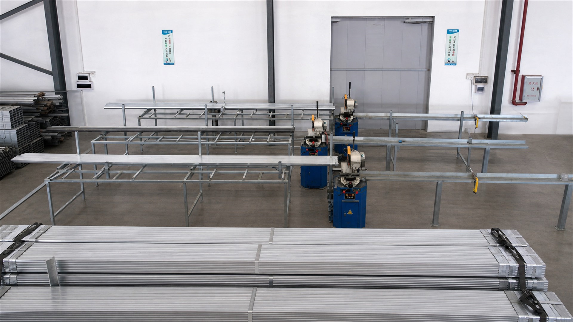 Profile cutting line preparing steel sections for guardrail fabrication