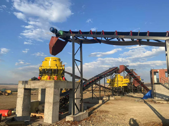Stone crushing production line site with screening and conveying equipment