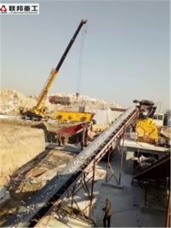 Stone crushing production line overview with feeding, crushing, screening and conveying stages