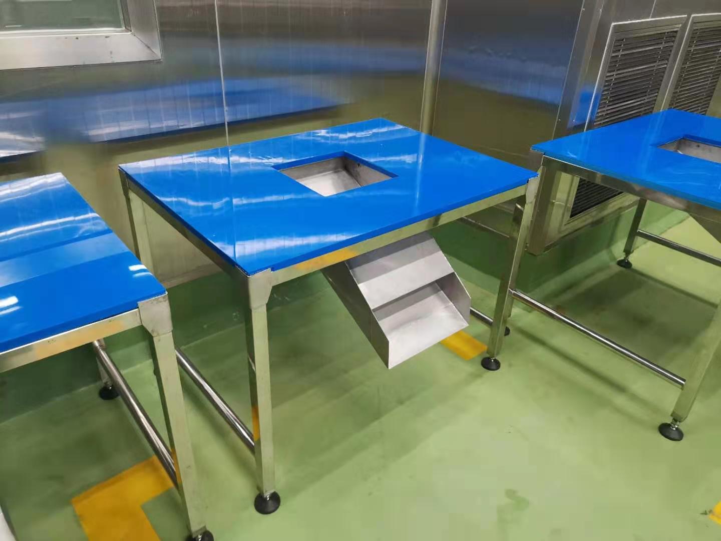 Food grade HDPE sheet used as a cutting surface in a food machinery application