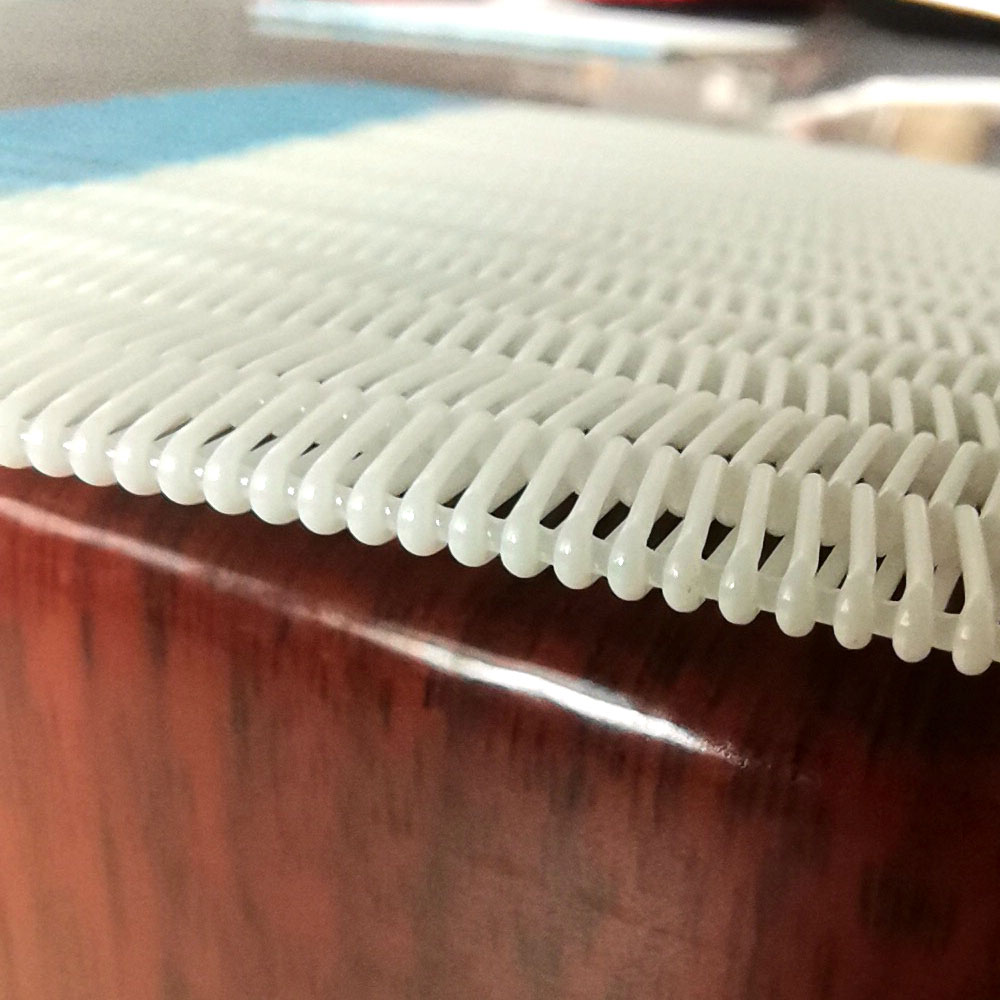 Polyester spiral mesh belt showing open loop structure