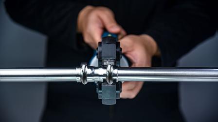 press fit fitting on site installation scene in building services