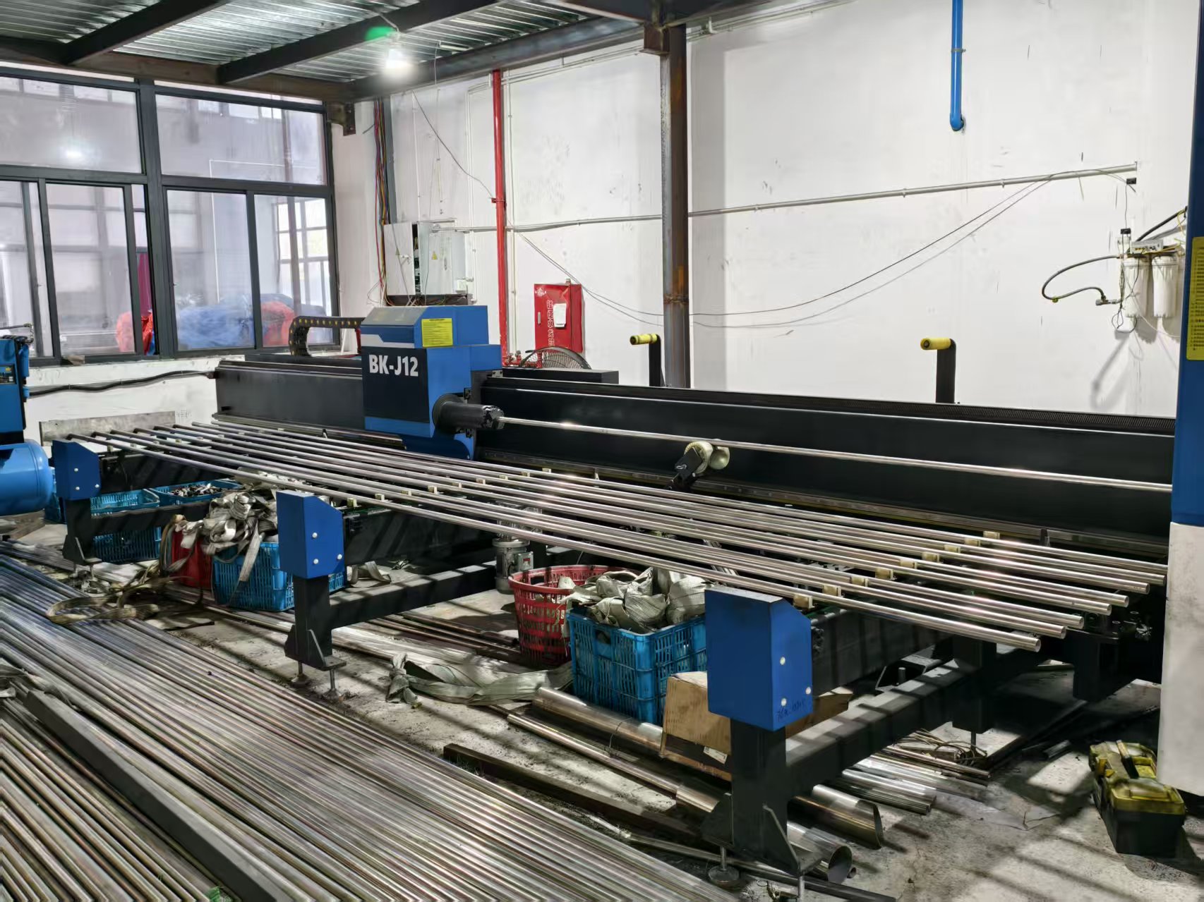Mass production line for stainless steel press fittings in a 9000 square metre manufacturing facility