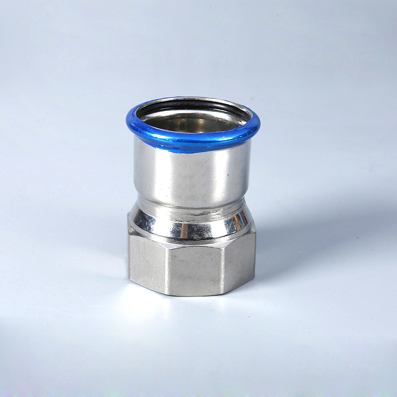 Stainless steel press‑fit female thread coupling for plumbing connection