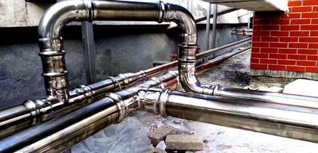 Commercial building press-fit piping mechanical room