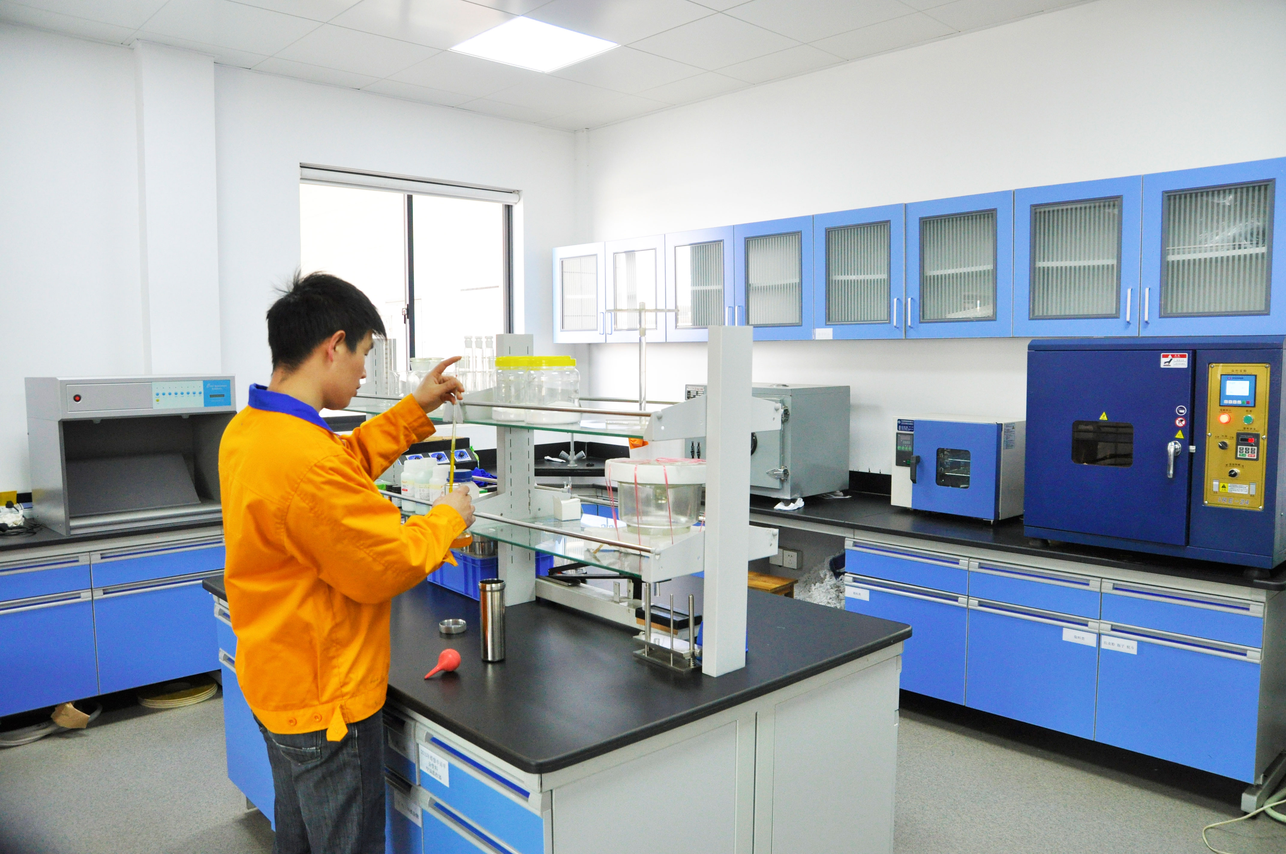 Ribbon factory laboratory with color fastness and biodegradability testing equipment