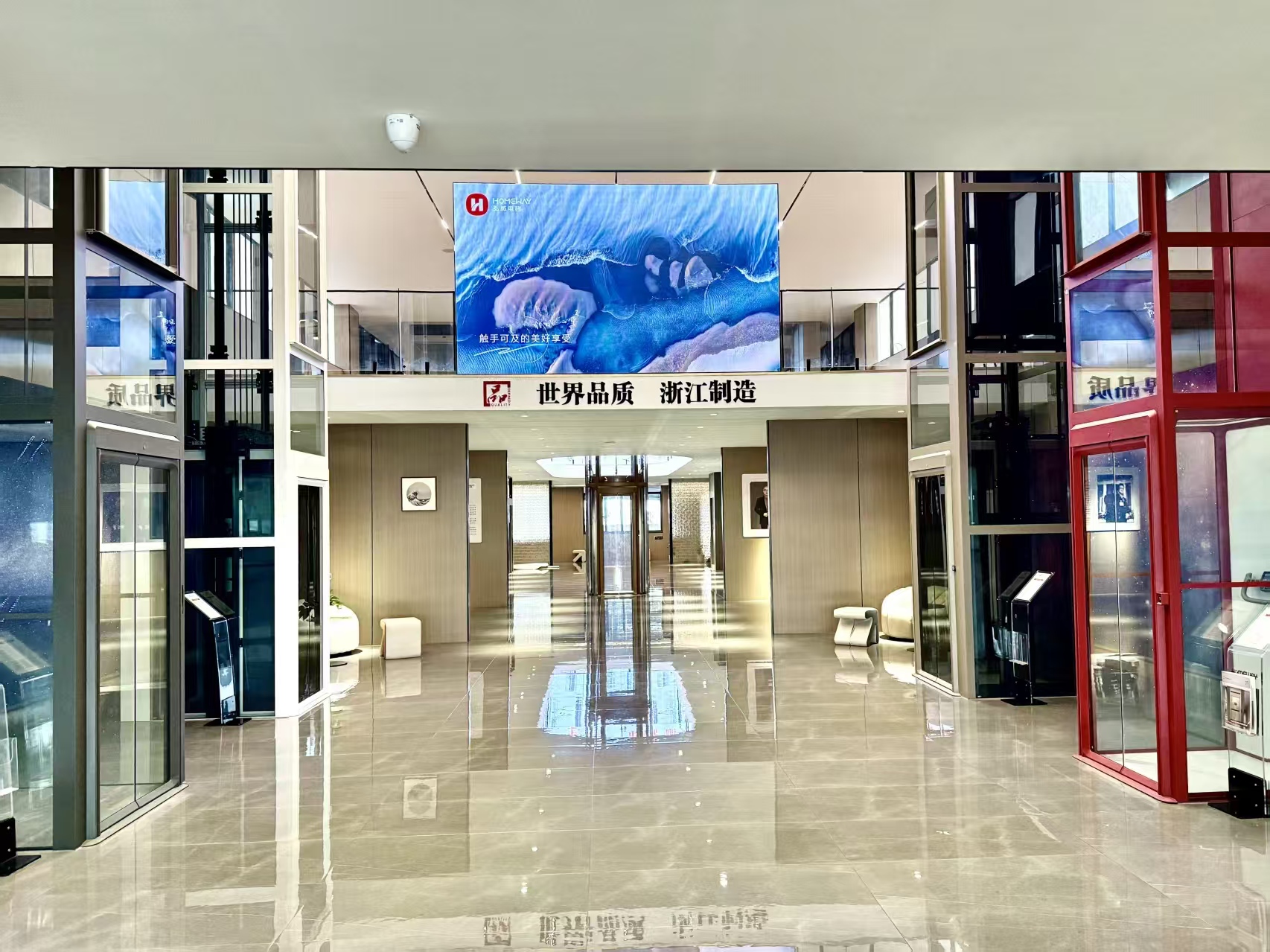 Homeway Elevator showroom displaying multiple residential elevator configurations for buyers