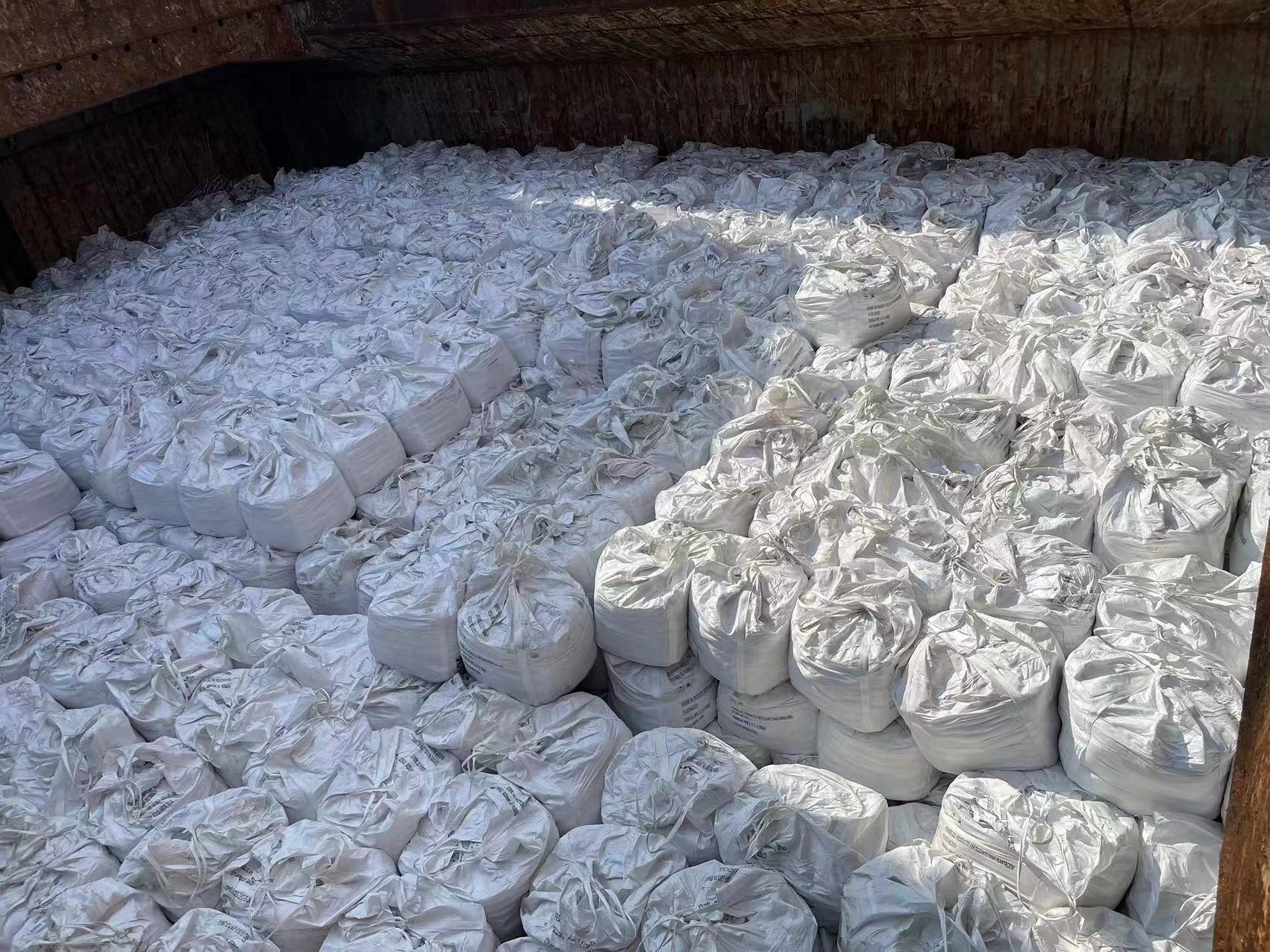 ASN granular nitrogen-sulfur fertilizer bags staged for shipment to agricultural distributors