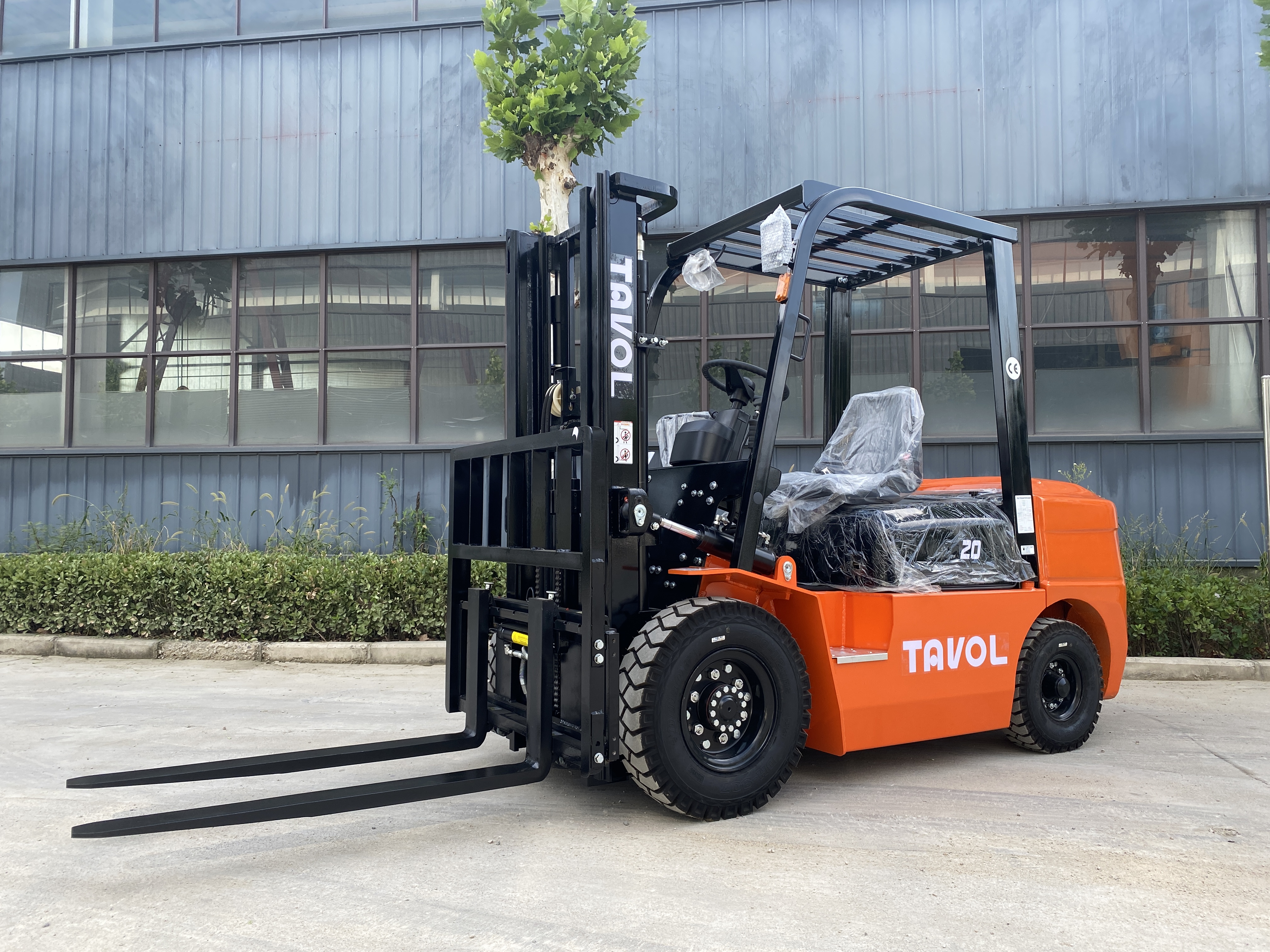 TAVOL three-ton class material handling forklift at an industrial site
