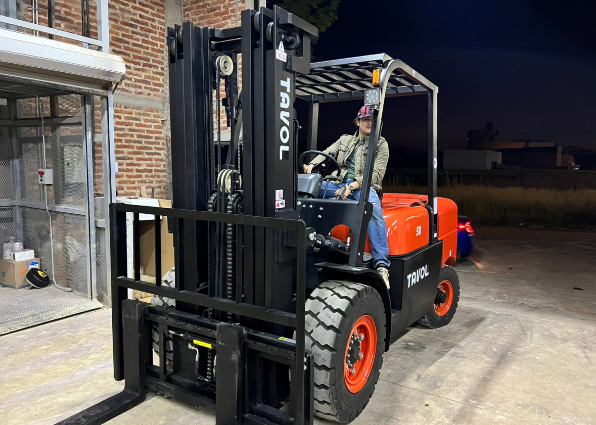 5-ton diesel forklift used for heavy industrial cargo handling in outdoor yard condition