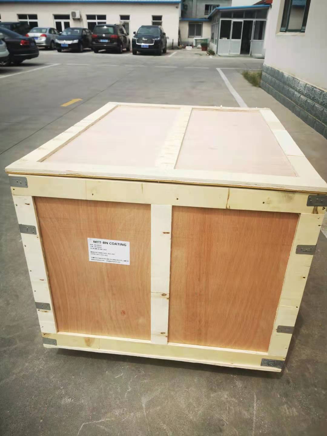 Boron nitride coating packed in wooden cases for export shipment