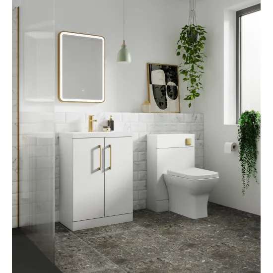 Bathroom vanity installation showing a wash basin cabinet and mirror within a complete bathroom furniture set