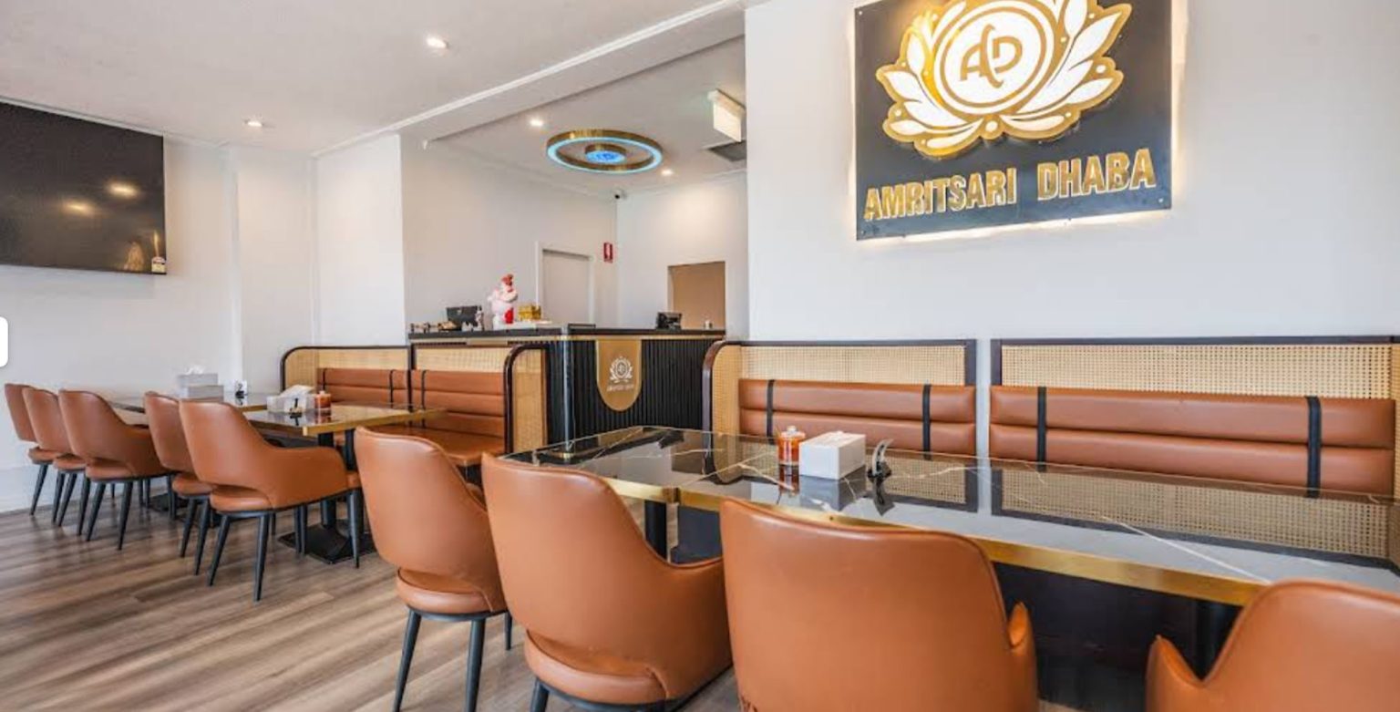 Commercial restaurant dining set combining upholstered chairs with rattan-front booth seating