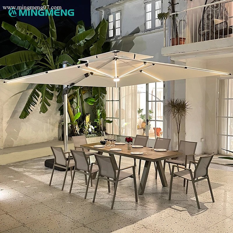 led-lighted-outdoor-dining-set-under-umbrella