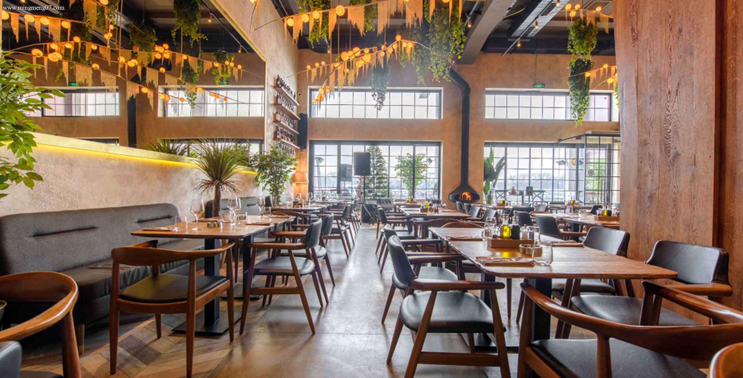 Commercial restaurant interior with coordinated dining furniture in a large-window urban setting