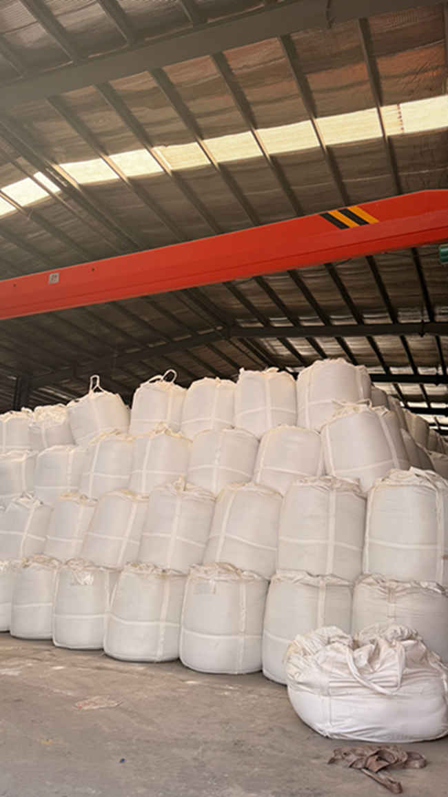 Bagged magnesium sulphate fertilizer staged in a warehouse for export shipment