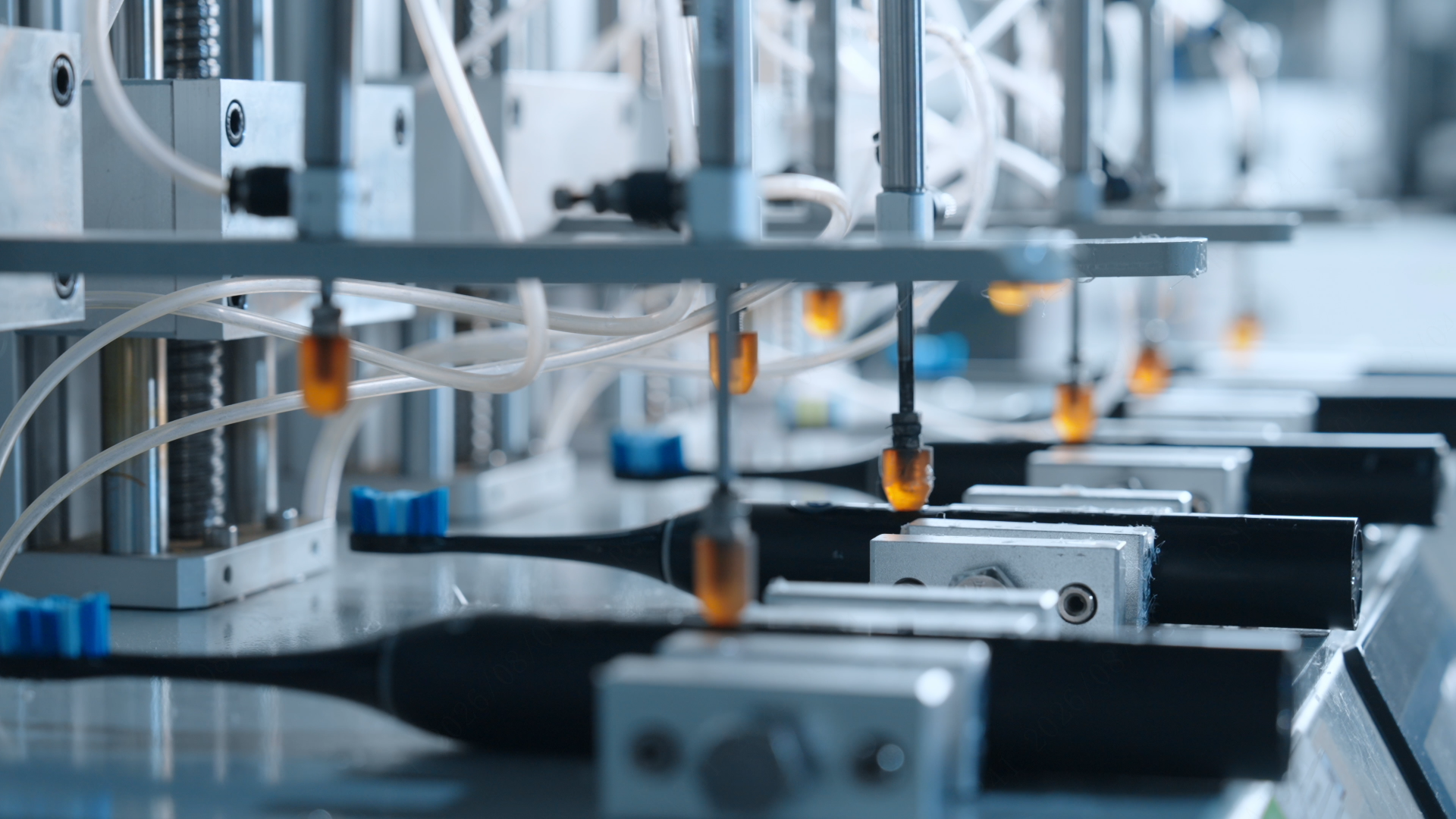 Button durability testing on electric toothbrushes and flossers at the Risuntech factory