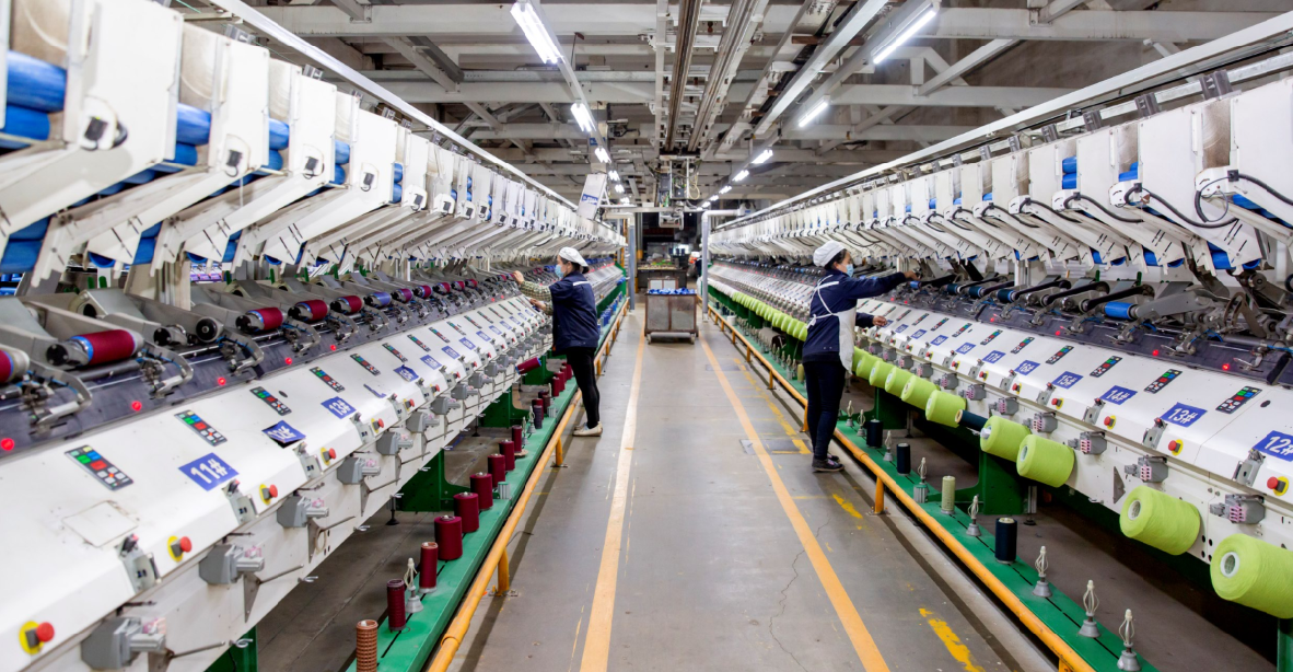 Industrial dyeing line where yarn is coloured before weaving for yarn-dyed fabric production
