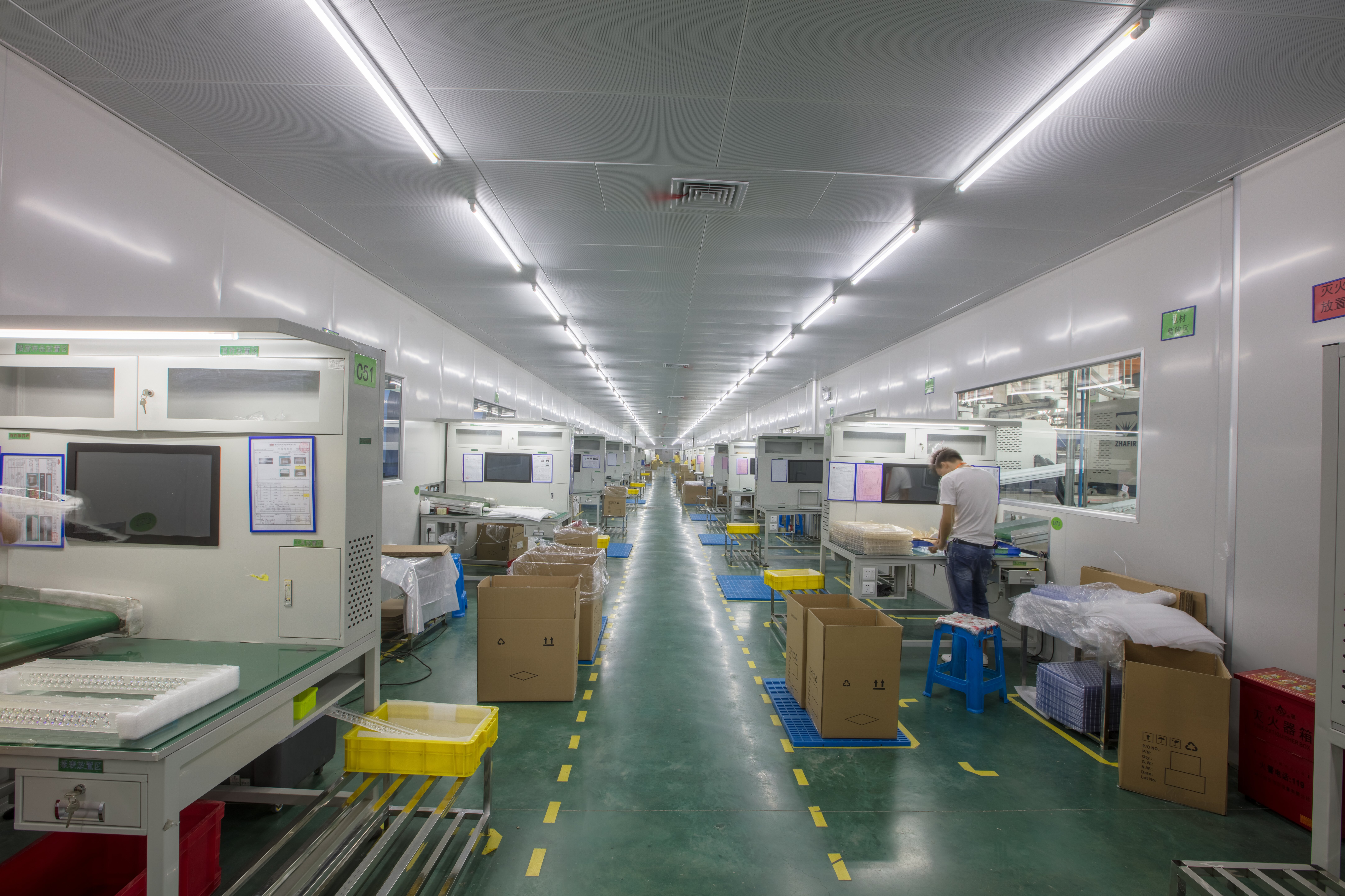 Clean-room workshop for optical lens inspection and assembly