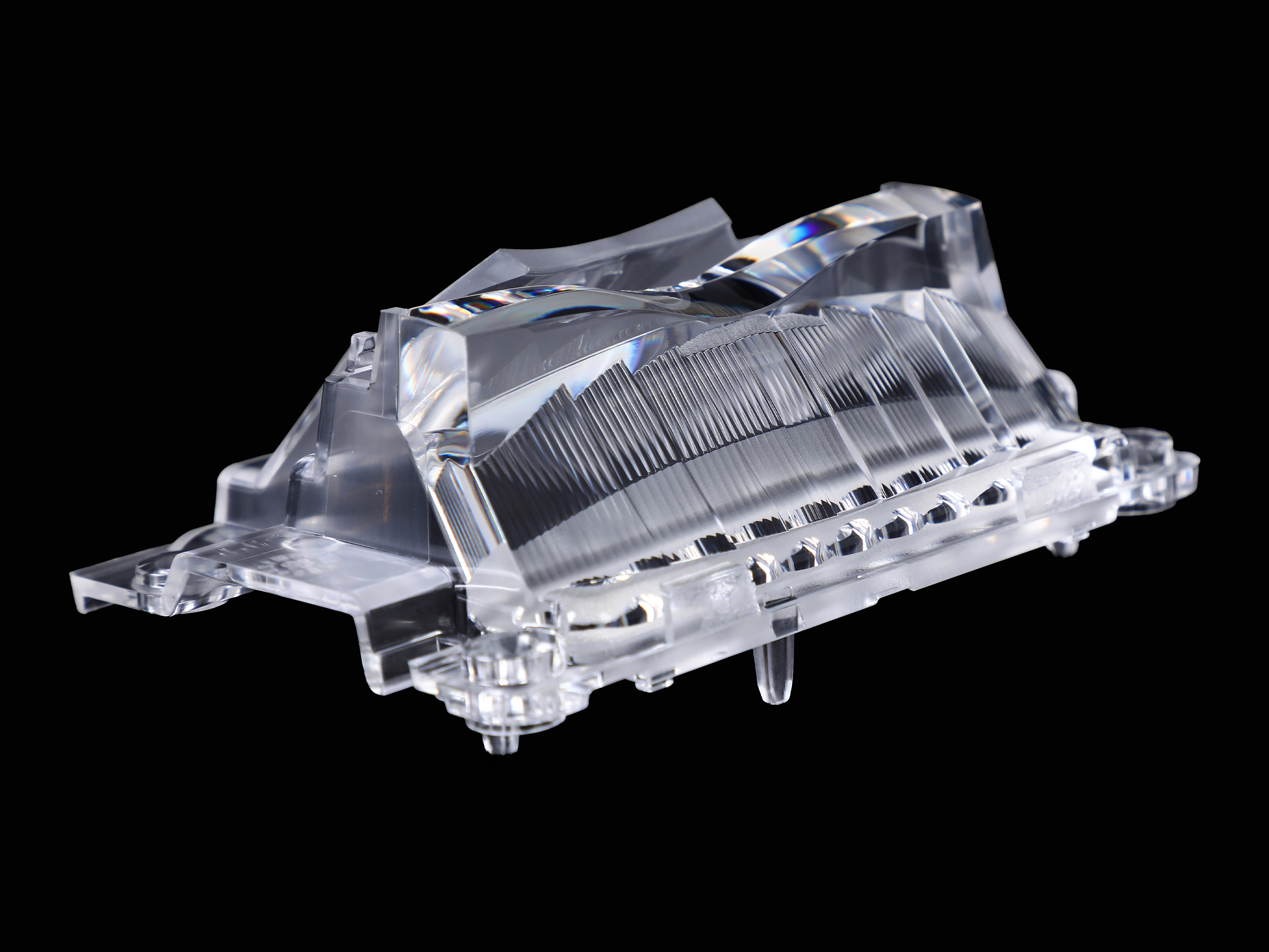 Automotive headlight low beam lens