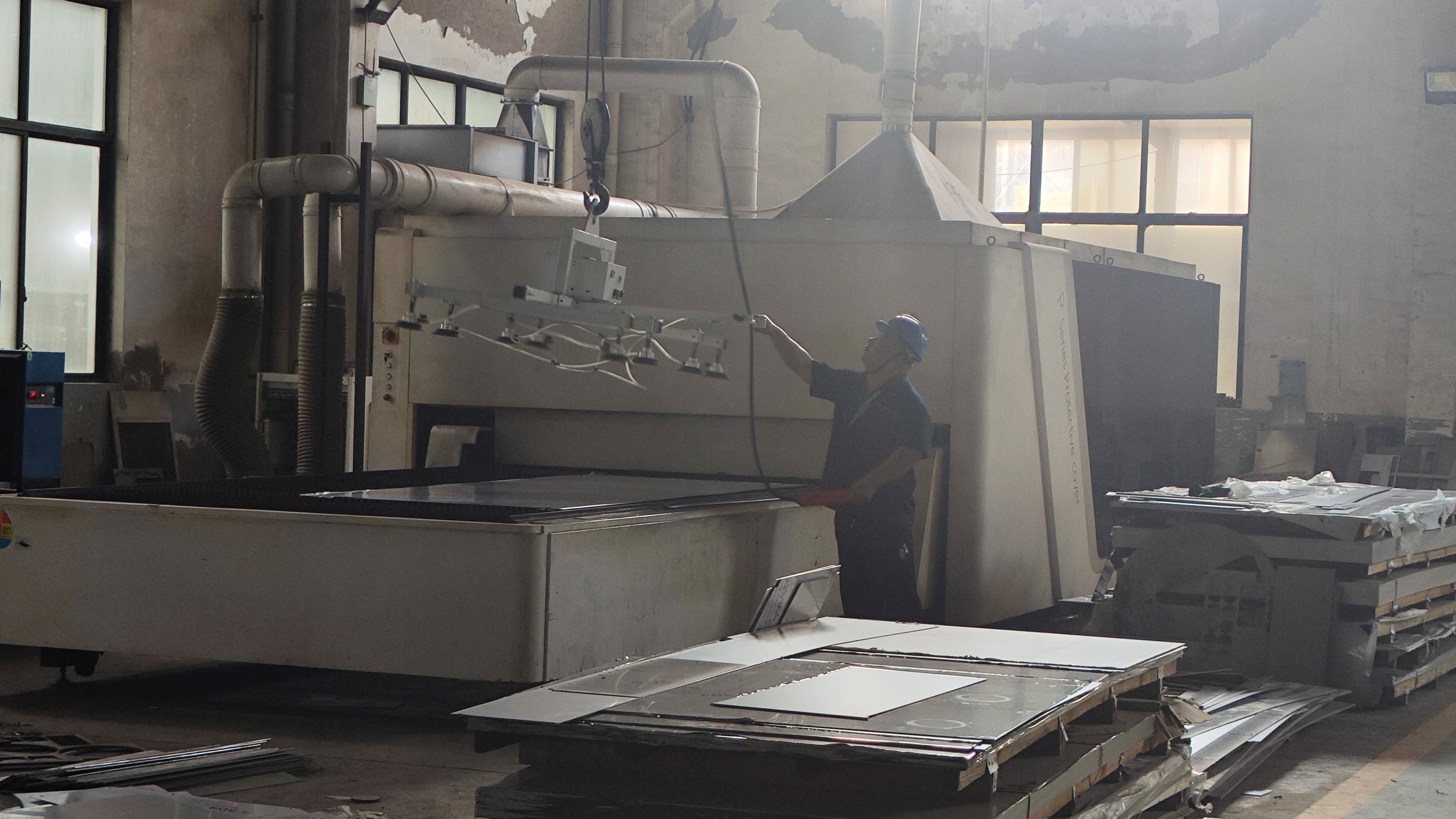 Haitel laser cutting machine preparing stainless steel components for food processing equipment