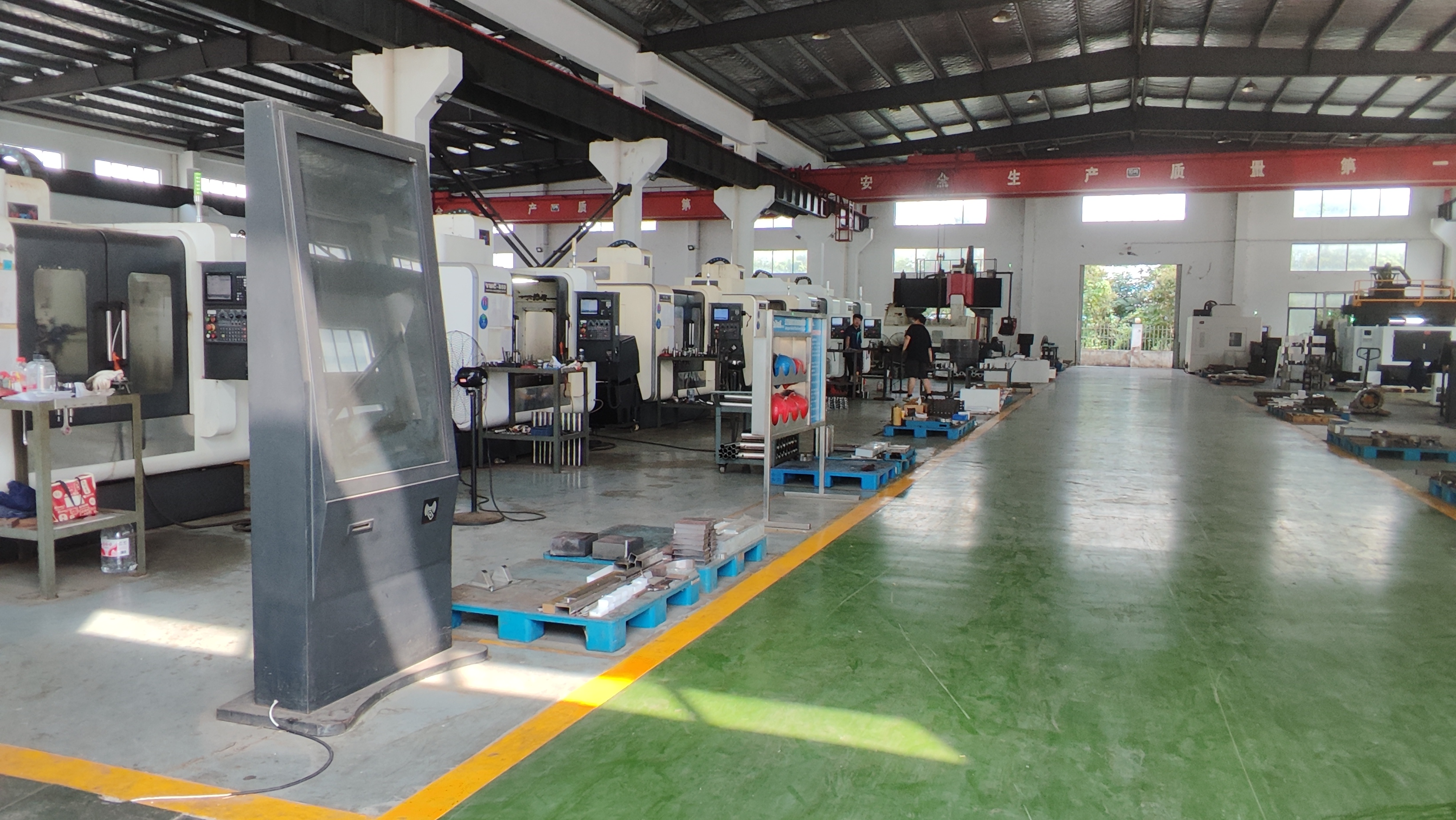 CNC machining workshop producing stainless steel components for food processing lines