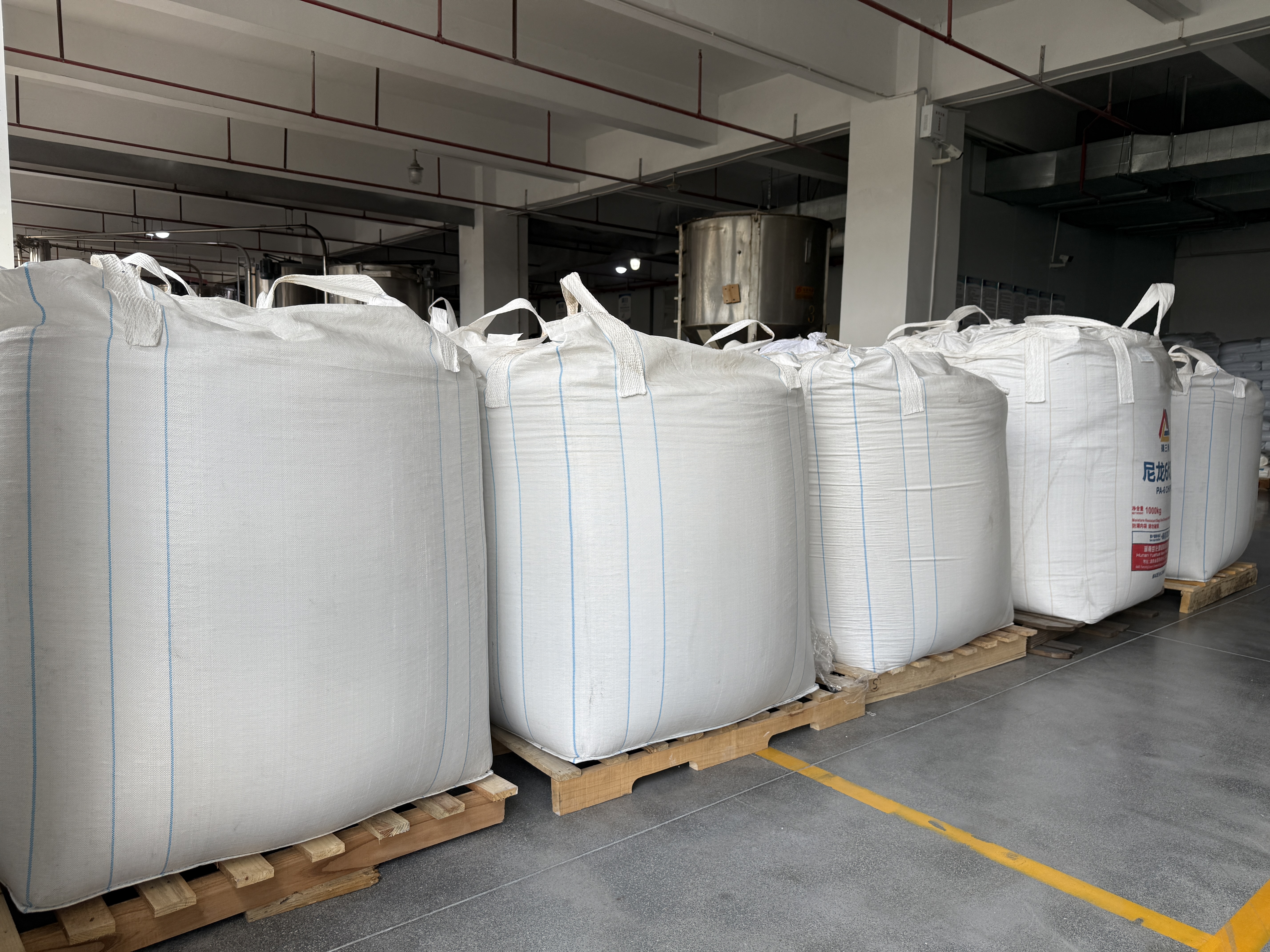 Incoming raw-material inspection and preparation at WanHan before compounding production.