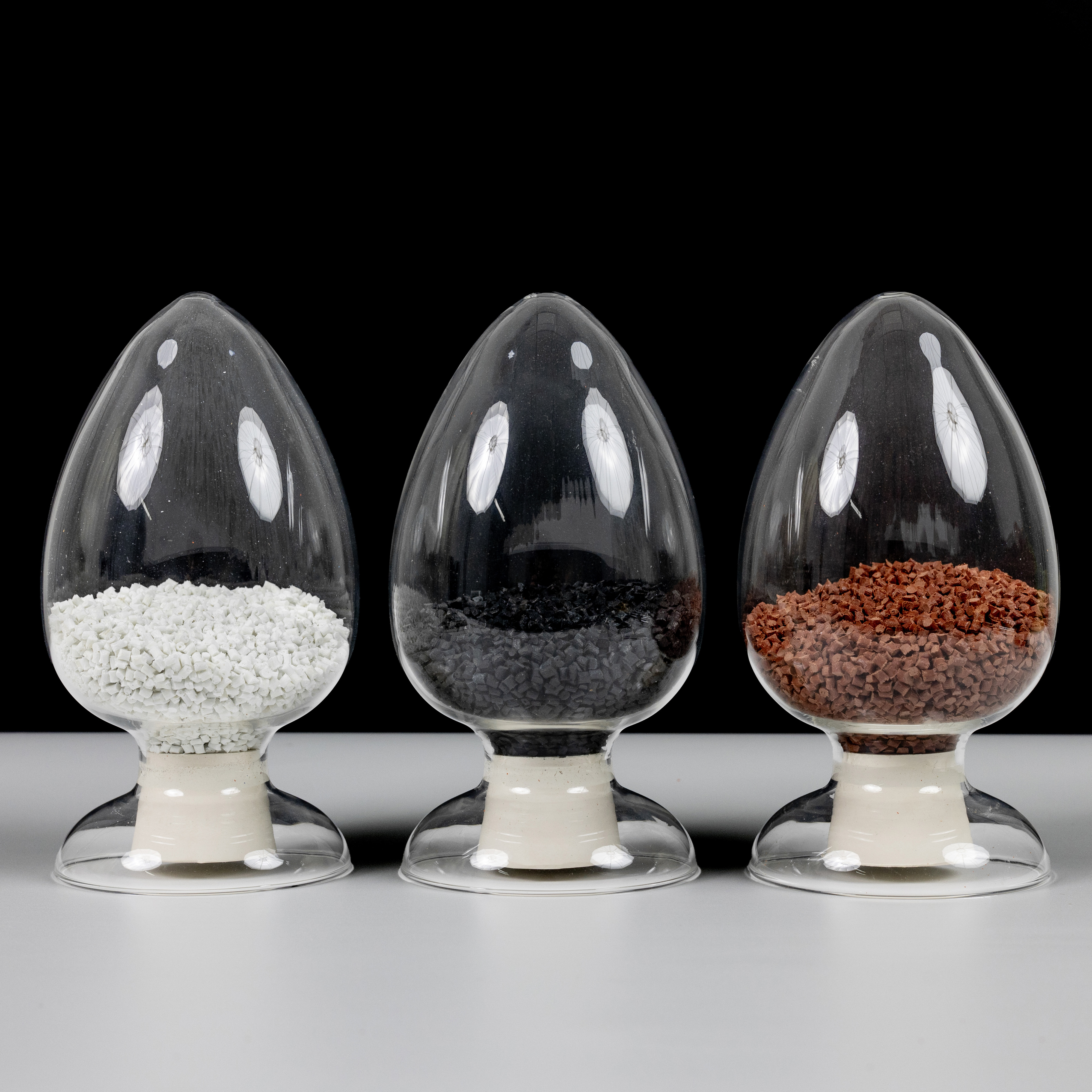 Representative WanHan modified engineering plastic pellet samples in natural, black and custom colors. Color and formulation are available according to specific material grades and application requirements.